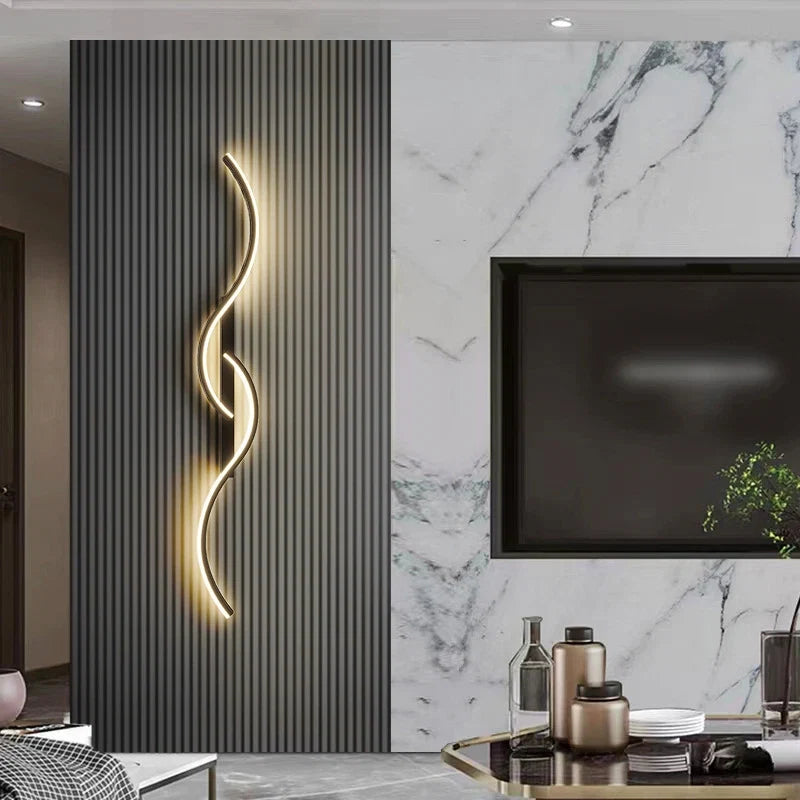 Modern minimalist long-strip LED wall lamp above a bedroom headboard